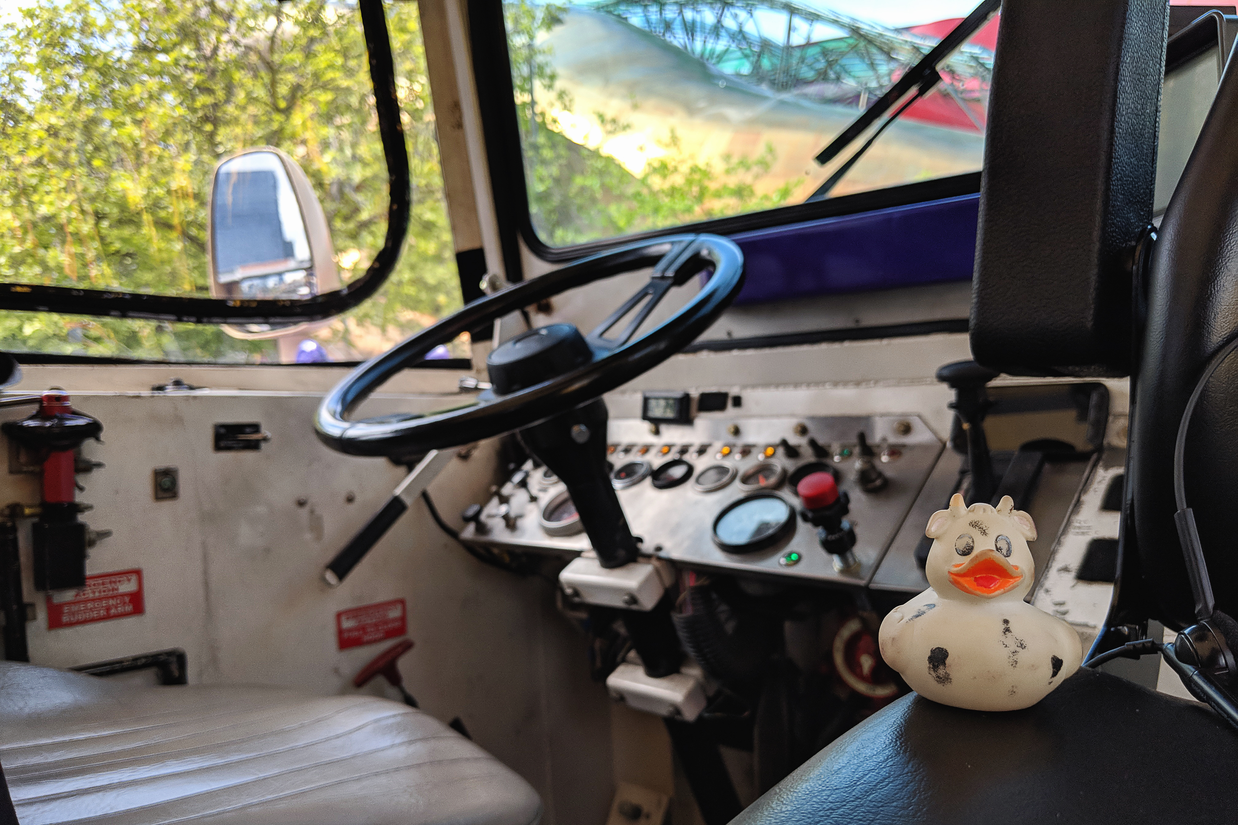 A photo of Bella the rubber duck on the tour guide's seat on a Duck Boat in Seattle, Washington